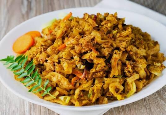 Chicken Kottu — Sri Lanka's iconic street food: shredded roti stir-fried with chicken, egg, and spices. at Food Cabin Galle